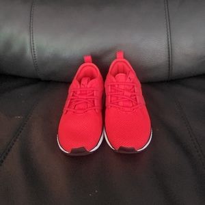 Child's red puma sneakers